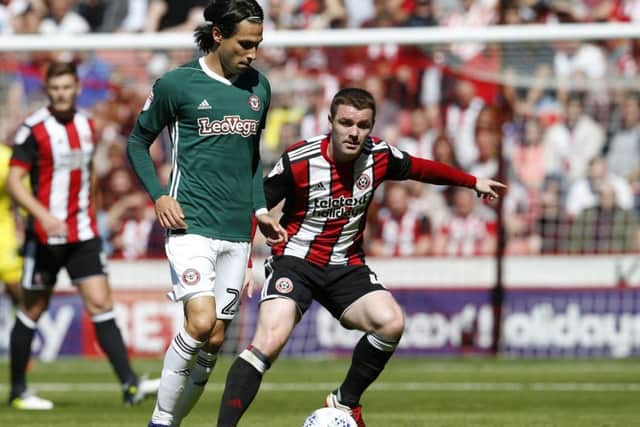 Off to Riverside?: Boro target Jota, of Brentford, tussling with John Fleck of Sheffield United.
Picture: Simon Bellis/Sportimage