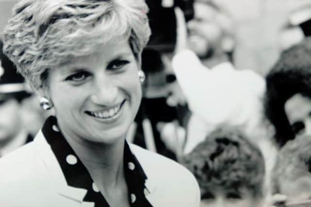 The Princess smiles as she enjoys meeting the crowd in Bingley in 1991.