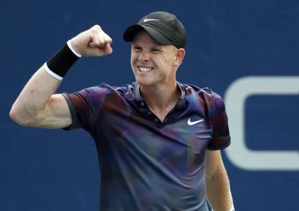 Yorkshire's Kyle Edmund celebrates beating Robin Haase at the US Open on Monday. Picture: AP/Michael Noble.