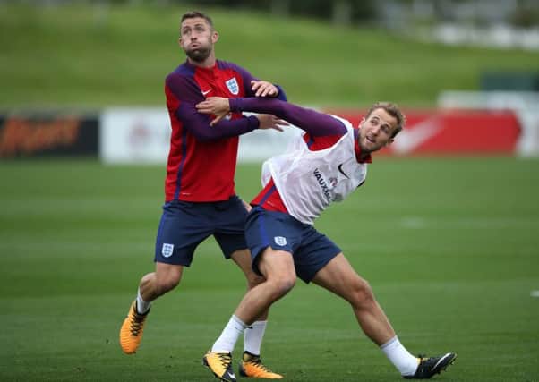 England's Gary Hill (left) and Harry Kane during a training session at St Georges' Park. Picture: Nick Potts/PA