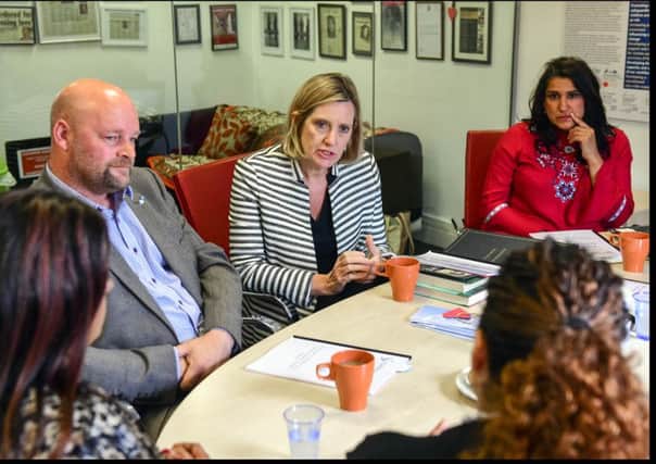Image Â©Licensed to i-Images Picture Agency.  Amber Rudd, Home Secretary, talks with survivors during her visit to Karma Nirvana, an honour-based violence and forced marriage charity in Leeds.