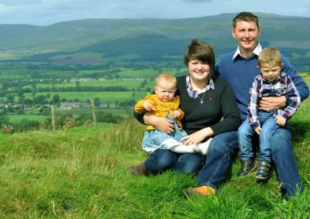 Megan and David Pedley with their children, Katy and Jack, on their farm at Winton near Kirkby Stephen.