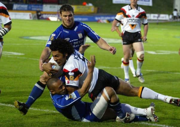 Bradford's Lesley Vainikolo: On his way to a record six tries against Hull.
Picture: Gareth Copley/PA