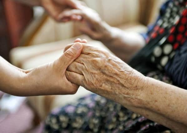 HELPING HANDS: A poll, carried out by Independent Age, finds that nine out of 10 MPs do not believe that the current social care system is fit for purpose. PIC: PA