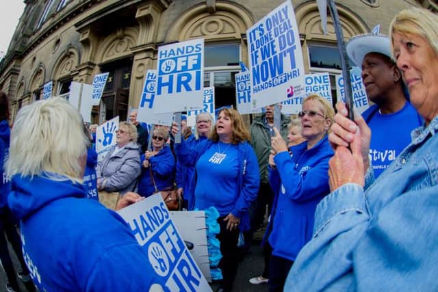 On the march: Campaigners from the Hands Off HRI group protested outside a recent meeting on the future of the towns hospital.