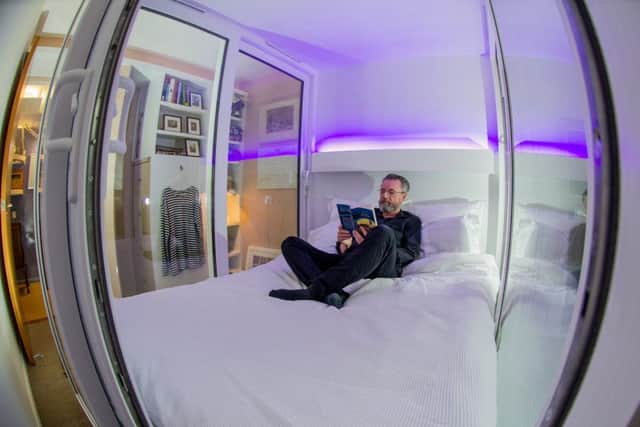 Architect John Fieldhouse in his  soundproof pod - a room within a room.