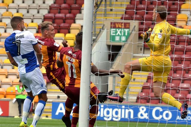 Charlie Wyke puts the Bantams in front (Photo: Bruce Rollinson)