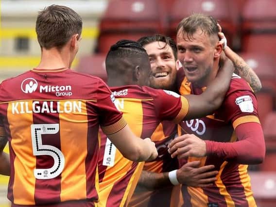 Charlie Wyke celebrates with his Bradford teammates after giving the Bantams the lead