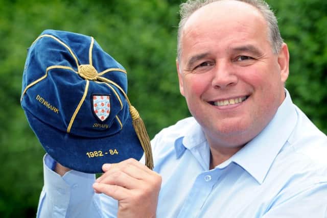Mel Sterland at home in Sheffield, pictured with his U21s cap.
