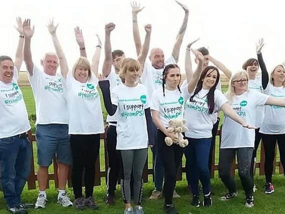 Three generations of the same family took to the air to raise money for research into a rare degenerative disease by taking part in a family skydive.