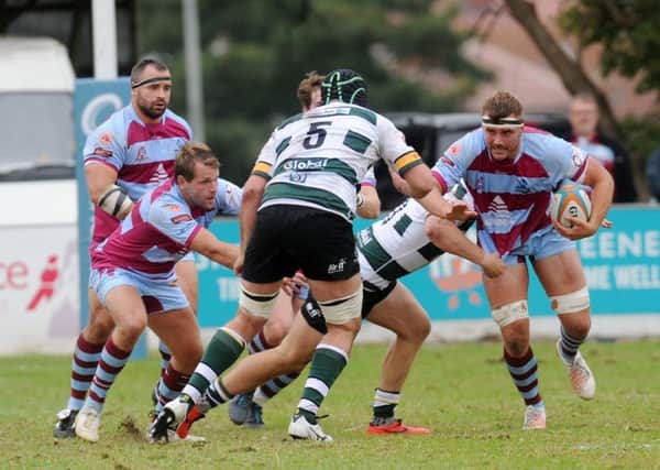 Rotherham Titans' Dan Grange tries to find a way through Nottingham. Picture: Steve Riding.