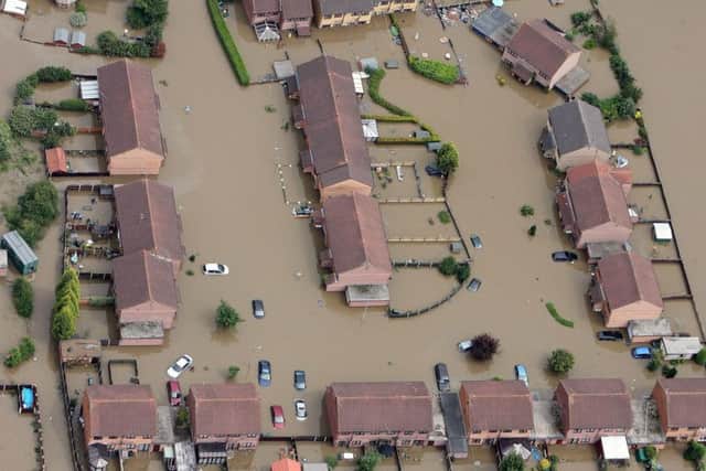 An aerial view of Catcliffe near Sheffield following floods in 2007. (PA).