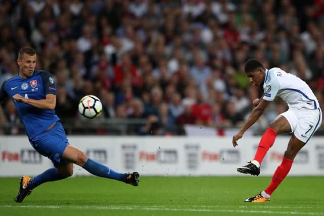 England's Marcus Rashford strikes the winning goal against Slovakia at Wembley. Picture: Nick Potts/PA.
