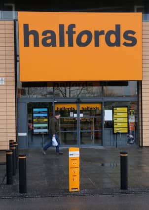 Library image of a Halfords store   Photo: Chris Radburn/PA Wire