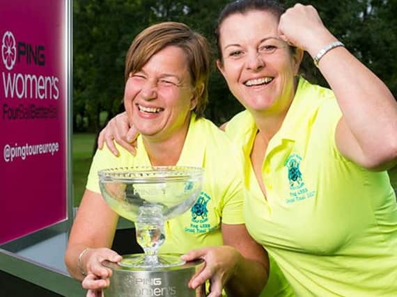 Tina Sampson, left, and Kerry Lamb with the PING womens fourball betterball Grand Final trophy  (Picture: Leaderboard Photography)