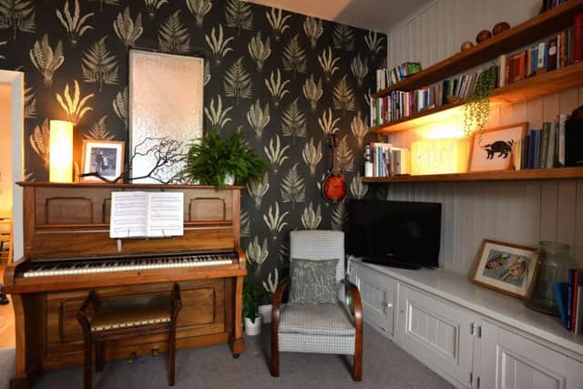 Hannah's piano and mandolin in the "music zone" of her multi-functional sitting room.
