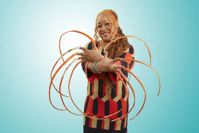Ayanna Williams who has the record for the  Longest Fingernails as she appears in the latest edition of Guinness World Records