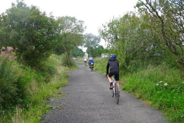 Cyclists on the Cinder Track, the former Scarborough-Whitby railway line