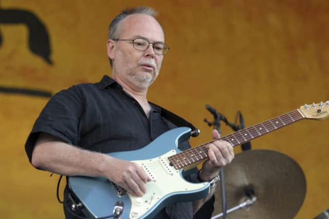 Walter Becker, of Steely Dan, performs during the 2007 Jazz and Heritage Festival in New Orleans.