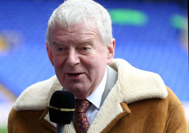 Football man: John Motson is hanging up the microphone at the end of this season. (PA).