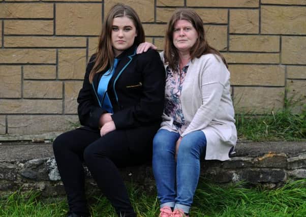 Colette Milligan, the mother of  Leeds West Academy pupil Abigail Longhorn, 15 said teachers attempted to put her daughter in isolation for the day because the Â£7 school trousers she bought from the schoolwear section at Asda in Pudsey were "too elasticated" and did not have a button or zip. 7th September 2017. Picture Jonathan Gawthorpe