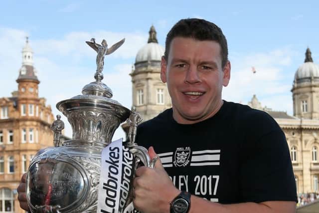 Illness-hit: Hull FC coach Lee Radford with the Challenge Cup.