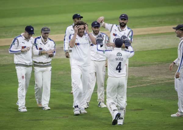 Yorkshire's Ryan Sidebottom is congratulated on dismissing Middlesex's Sam Robson. Picture by Allan McKenzie/SWpix.com