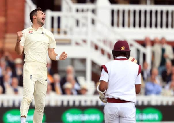 England's James Anderson celebrates taking the wicket of West Indies' Kraigg Braithwaite. Picture: Adam Davy/PA