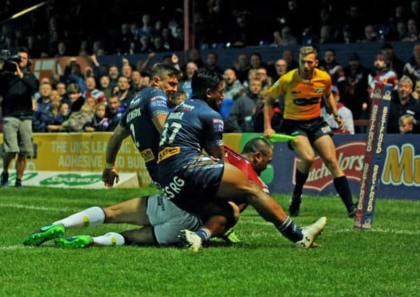 Wakefield's Bill Toupou scores his first try. Picture Jonathan Gawthorpe