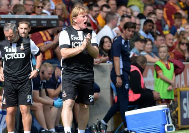 Stuart McCall: 
Bradford City chief is delighted to have Charlie Wyke firing.