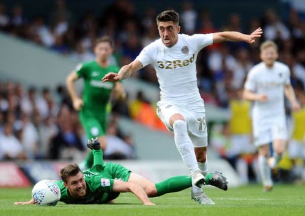 Leeds United's Pablo Hernandez skips away from Preston's Paul Huntington.