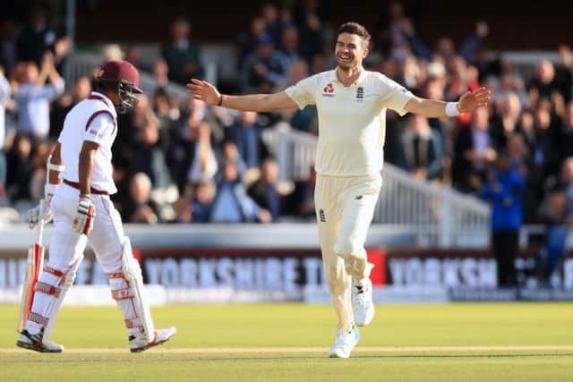 England's James Anderson celebrates after bowling West Indies' Kraigg Brathwaite to take his 500th Test wicket