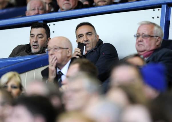 Owls Carlos Carvalhal watches the game from the stands after his two match touchline ban...Pic Steve Ellis