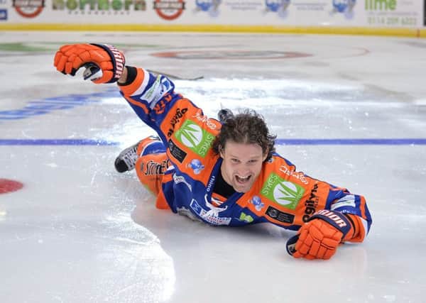 ON THE SLIDE: Levi Nelson, showing his delight at Sheffield Steelers' late win against Nottingham on Sunday. Picture: Dean Woolley.
