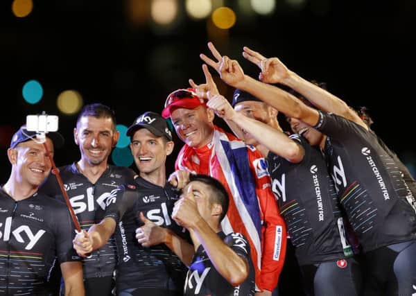 Chris Froome celebrates his La Vuelta win.
