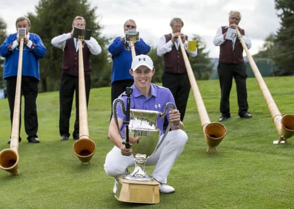 Sheffield's Matt Fitzpatrick poses with the trophy after the final round of the Omega European Masters Golf Tournament in Crans Montana, Switzerland.