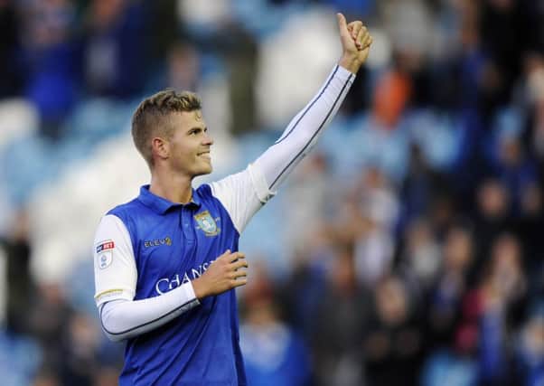 Thumbs up: Recent signing Joost van Aken salutes the Sheffield Wednesday fans after playing his part in their 3-1 win over Nottingham Forest on Saturday. (Picture: Steve Ellis)