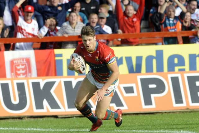 Hull KR player Ryan Shaw scores a vital try.