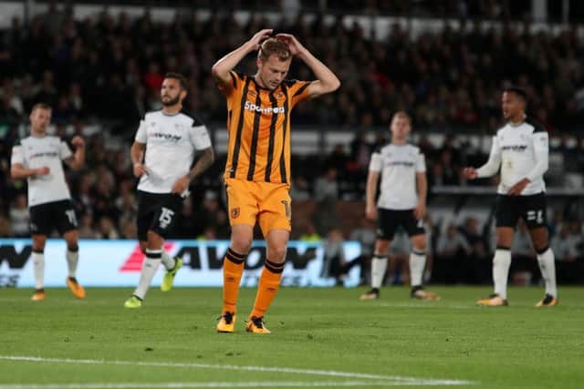 Hull City's Sebastian Larsson reacts after missing a penalty at Derby. Picture: David Davies/PA