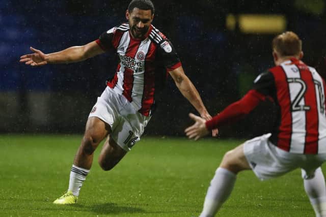 Cameron Carter-Vickers celebrates his winning effort for Sheffield United (Photo: Sportimage)