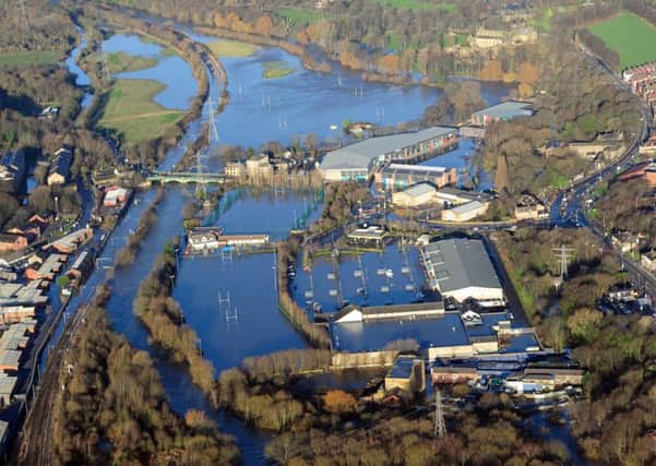 An aerial photo shows the scale of the flooding damage in Leeds in December 2015. The Kirkstall Road area is featured.