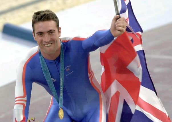 Jason Queally celebrating winning the Olympic Gold medal in the Men's 1000m time trial at the Sydney Olympic Games.