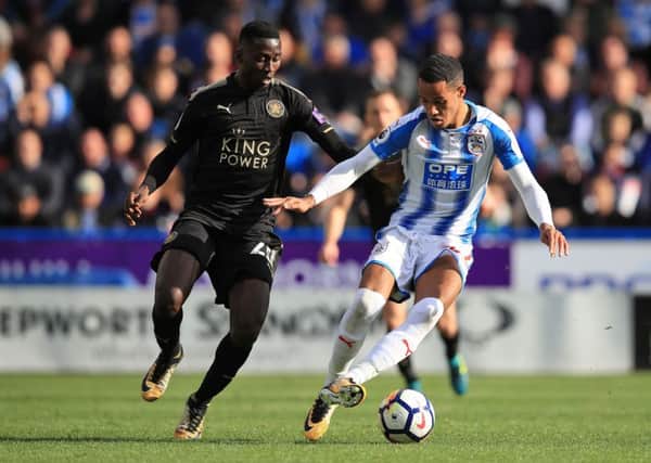 Leicester City's Wilfred Ndidi (left) and Huddersfield Town's Tom Ince in action.