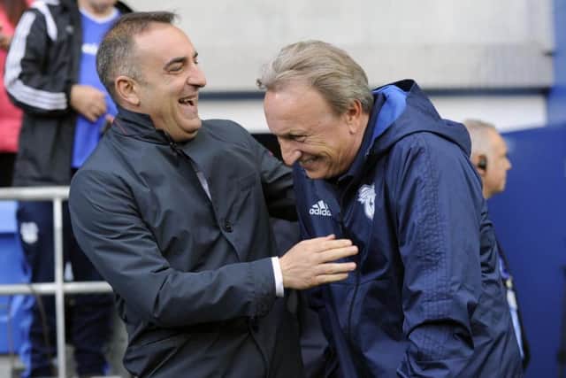 Carlos Carvalhal and Neil Warnock share a joke before kick-off