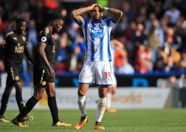 Huddersfield Town's Danny Williams rues a missed chance.
