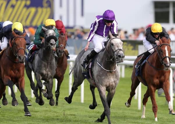 Ryan Moore aboard Capri holds on to win the St Leger