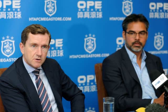 Huddersfield Town chairman Dean Hoyle, left, with head coach David Wagner.
 Picture: Jonathan Gawthorpe