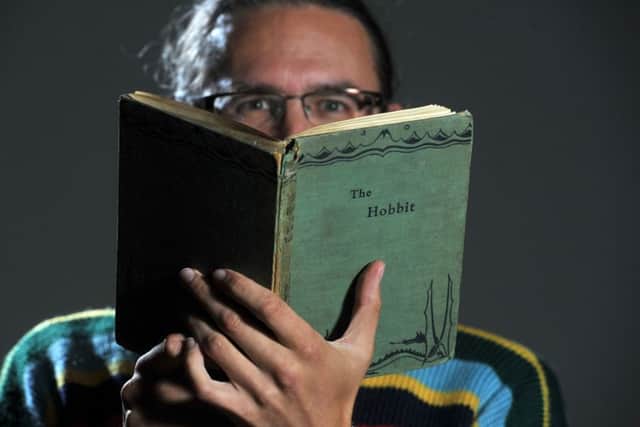 Dr Alaric Hall, Senior Lecturer in Medieval English Literature, with a 1st edition copy of The Hobbit. (Tony Johnson).