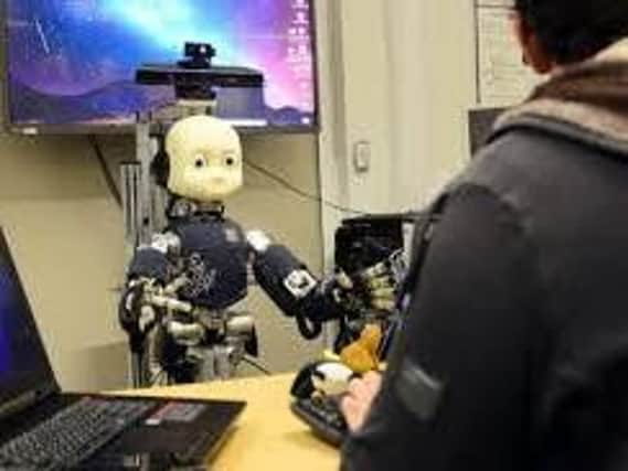 A robotics researcher working at the University of Sheffield