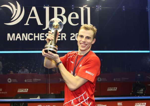 Nick Matthew, pictured in Manchester with the 2013 World Championship trophy after winning the event for a third time
.Picture: PSA World Tour